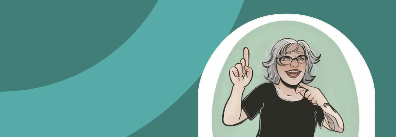 sage green background with a dark gray semi circle on the right is an arch frame and a closed laptop with a pair of glasses on top sitting next to a white wireless mouse on a walnut stained desk